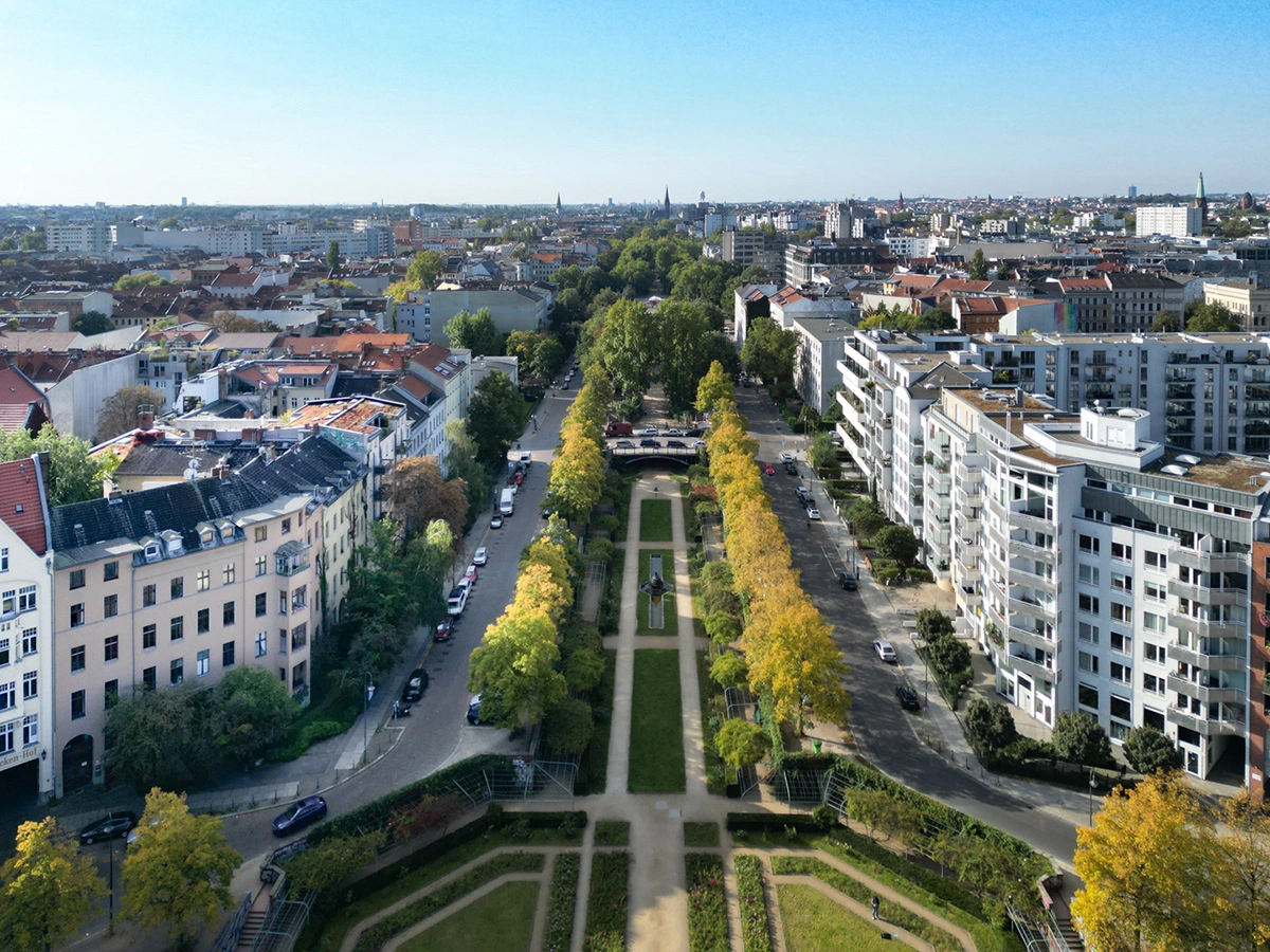 Wide aerial drone view showing Berlin location context and surrounding streets