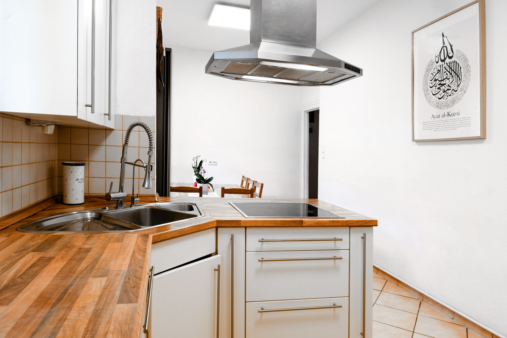 Modern kitchen real estate photography with island and warm light